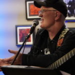 Steve Bassett performs spoken word during the performance in Birmingham.